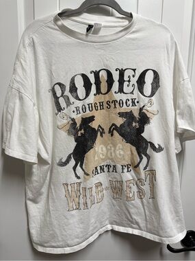 Divided White Rodeo Graphic Tee with Black and Tan Print